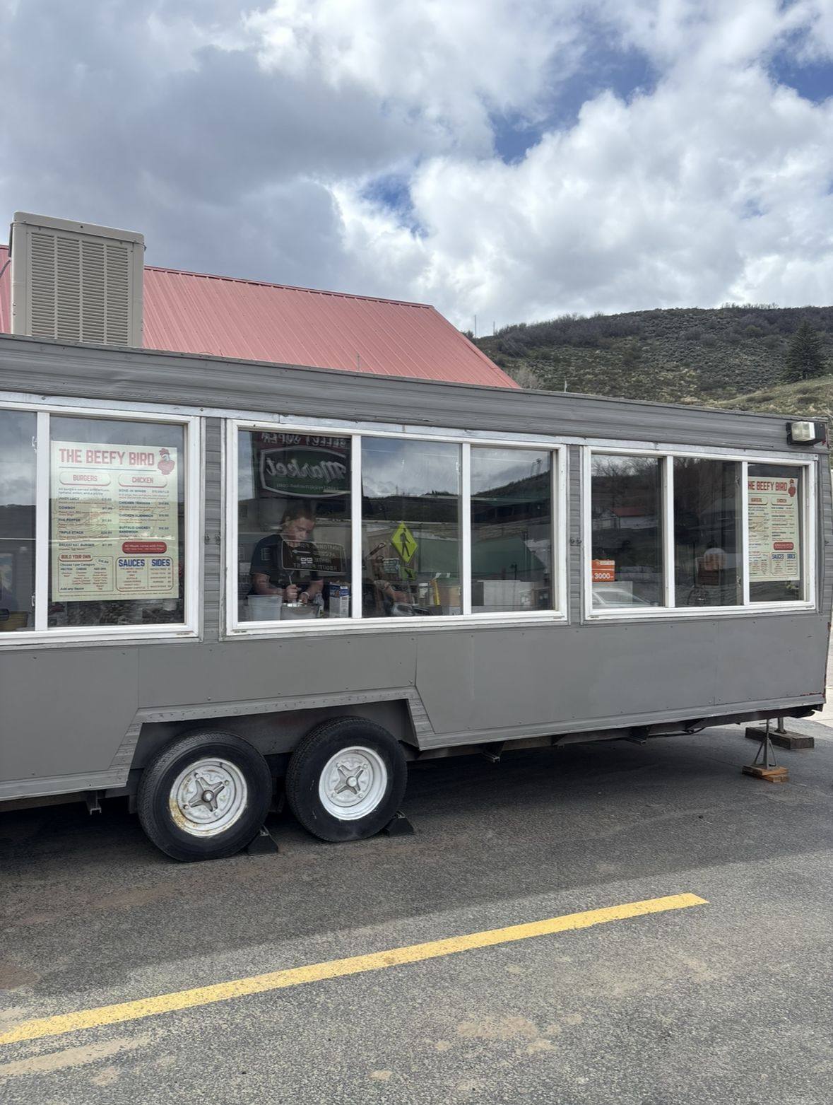 The Beefy Bird food truck parked at Select Super Market in Oak Creek, CO